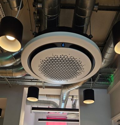 Samsung circular ceiling cassette air conditioning unit in a commercial interior
