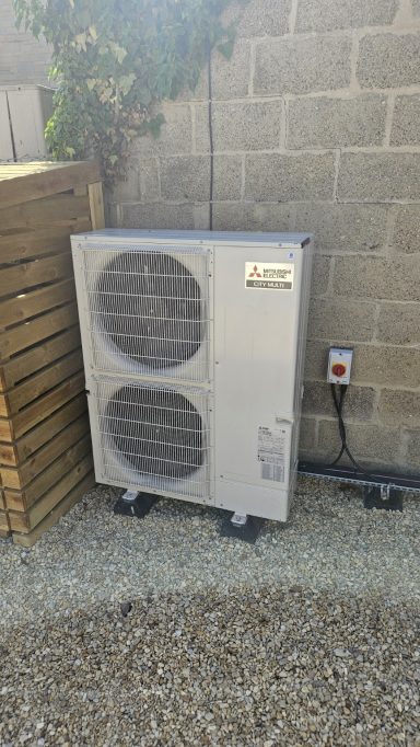 Mitsubishi Electric outdoor air conditioning unit installed by Exact Temp